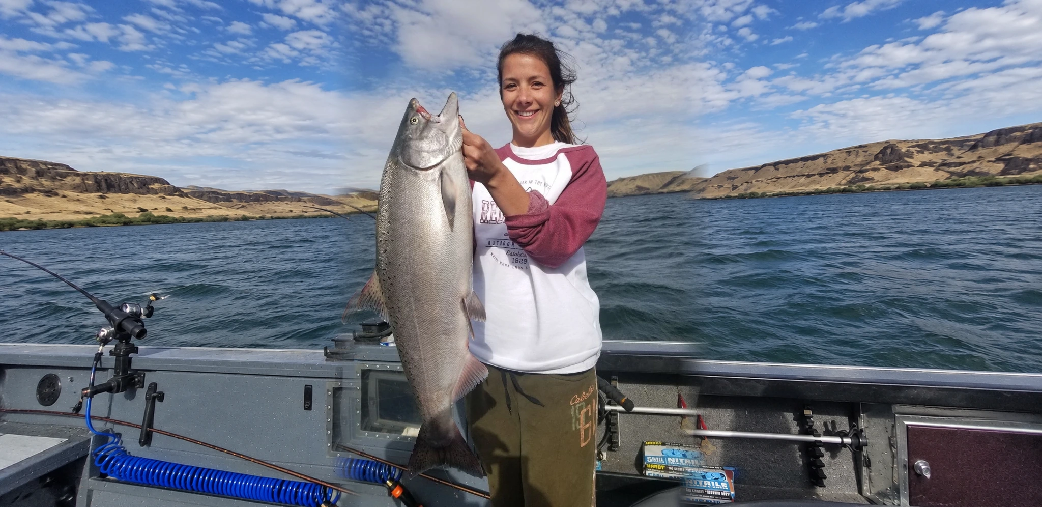 Woman holding a large Columbia River salmon