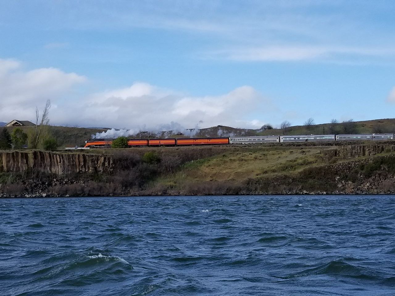 Train running beside the Columbia River