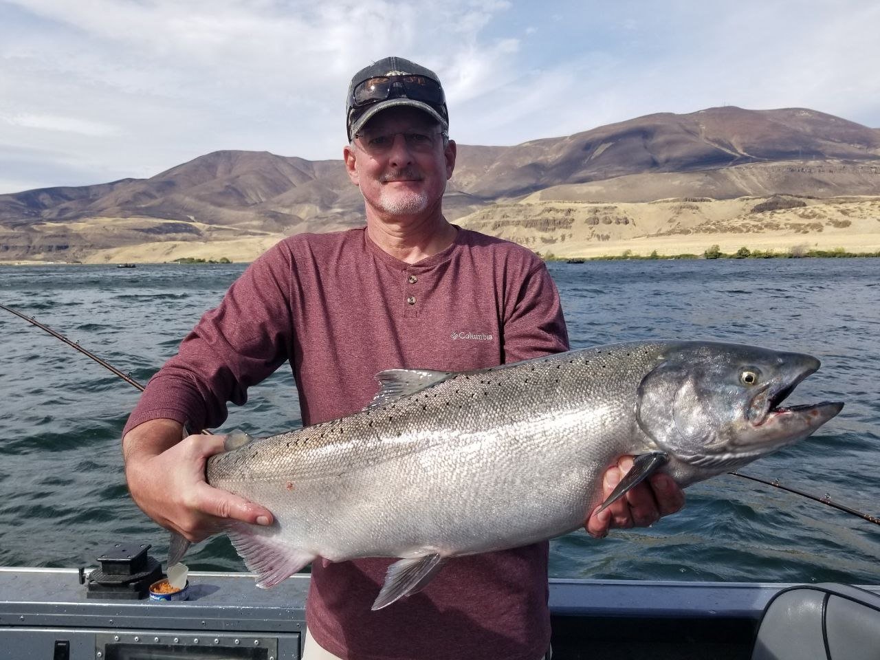Angler holding a salmon