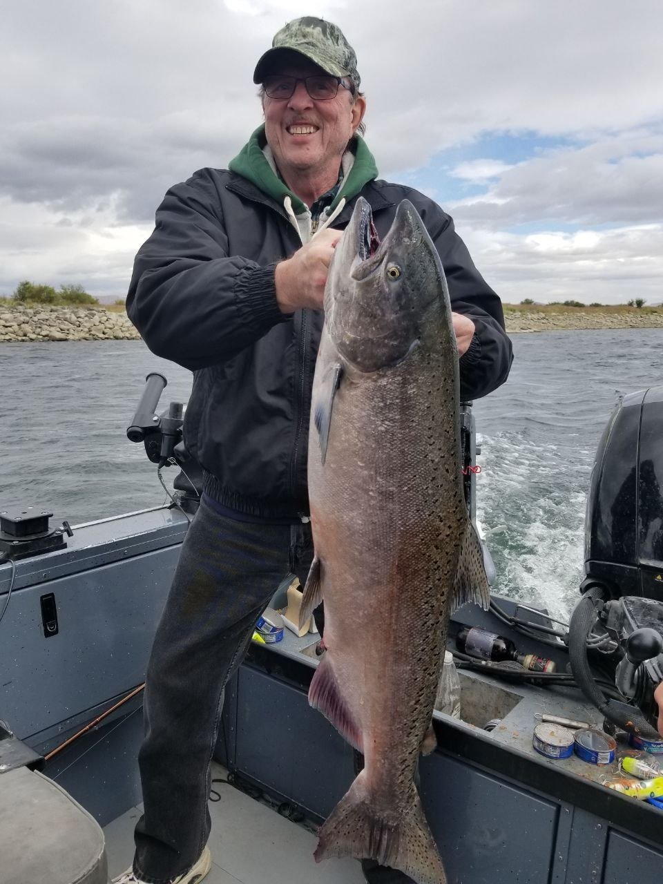 Angler holding a sturgeon