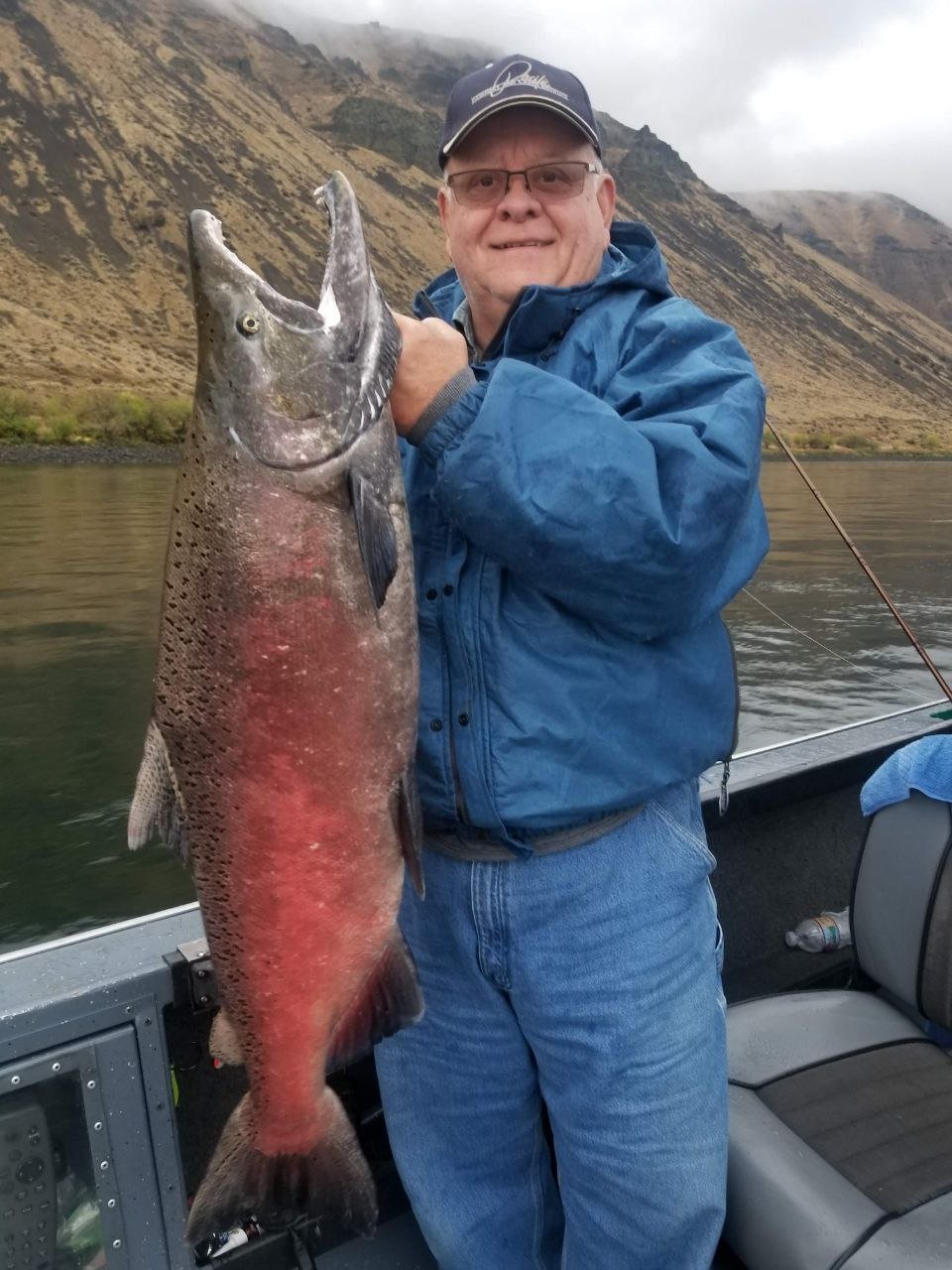 Angler holding a large salmon