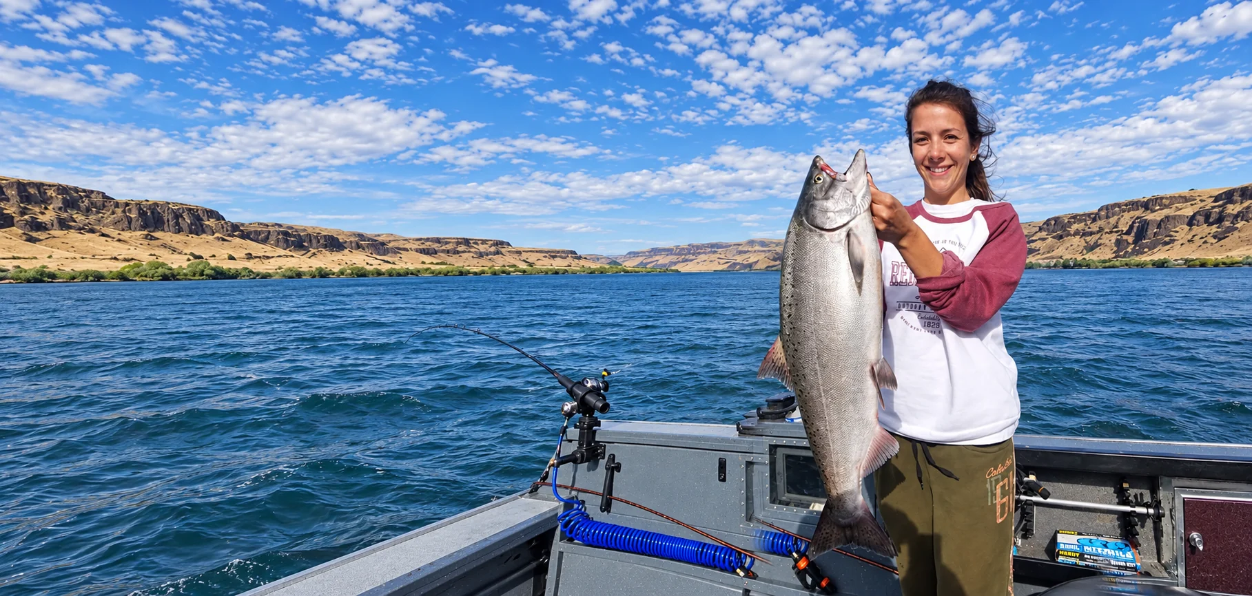 Woman holding a large Columbia River salmon