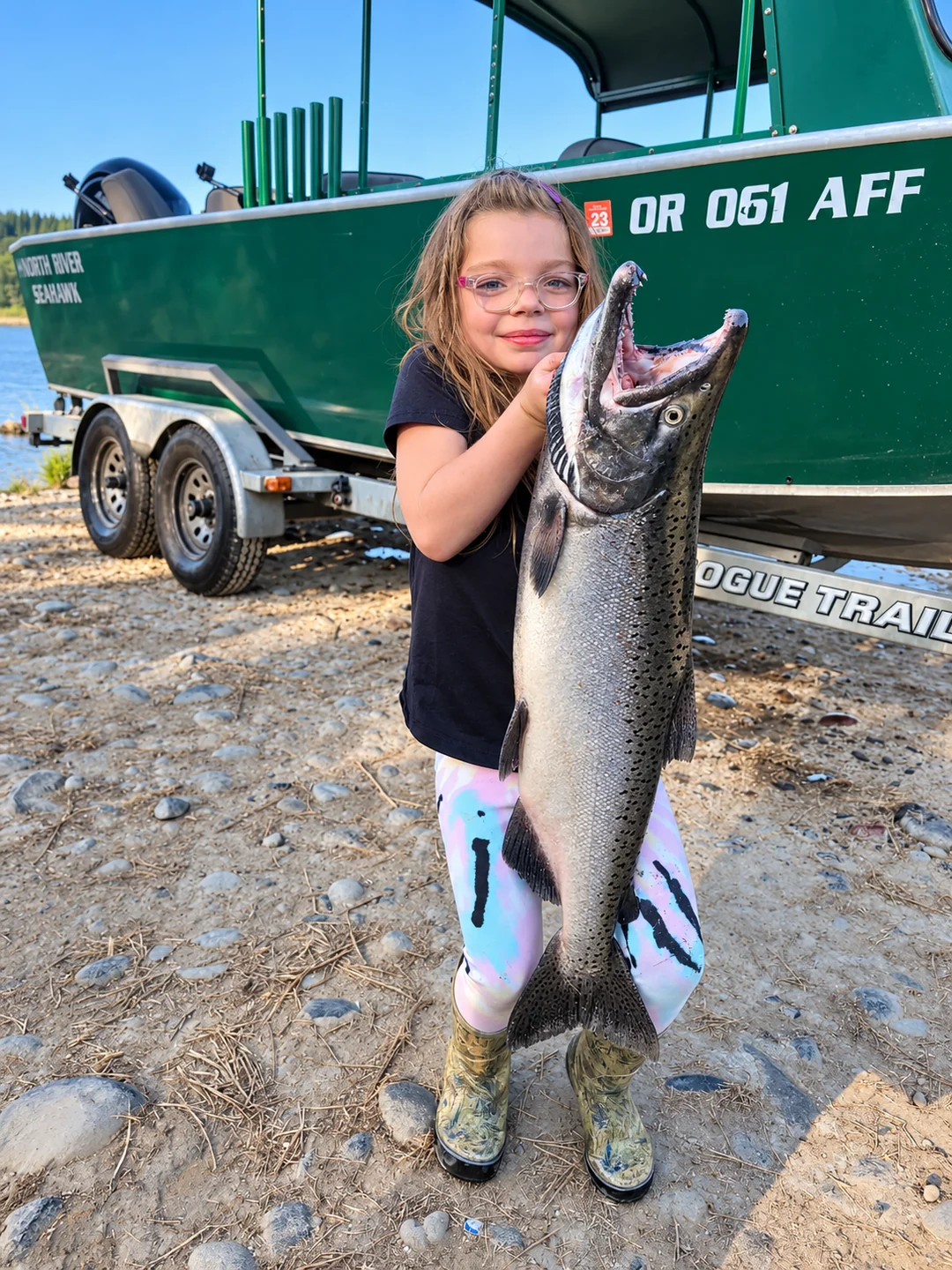 Young angler holding a Columbia River salmon
